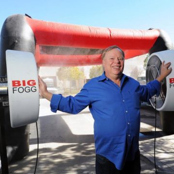 Chris BigFogg BigFogg CEO Christopher Miehl stands in front of high-pressure misting fans used by many NFL teams. Behind him is another popular product , an inflatable mister at his Temecula office Monday.
